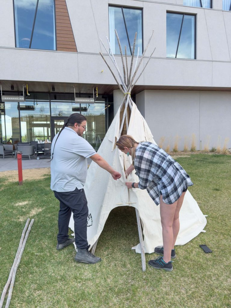 Building a teepee at Dakota Dunes Resort