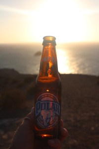 Smuggled Venezuelan beer at sunset at the look-out point.