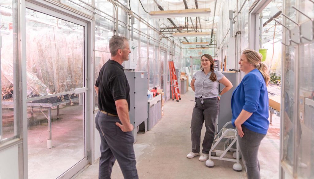 Scientists in the greenhouse at Nutrien's seed breeding facility.